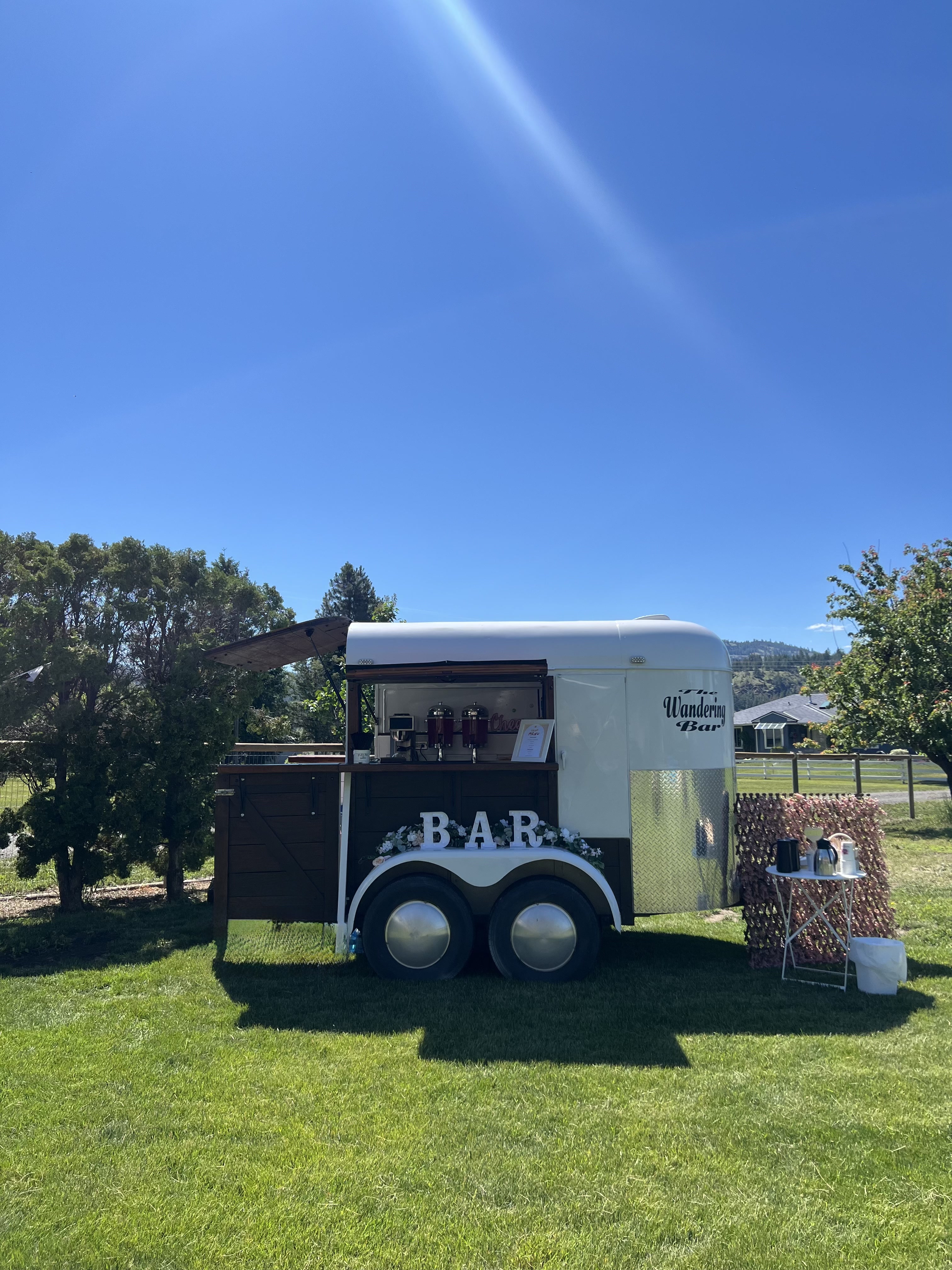 The Wandering Bar mobile trailer setup outdoors