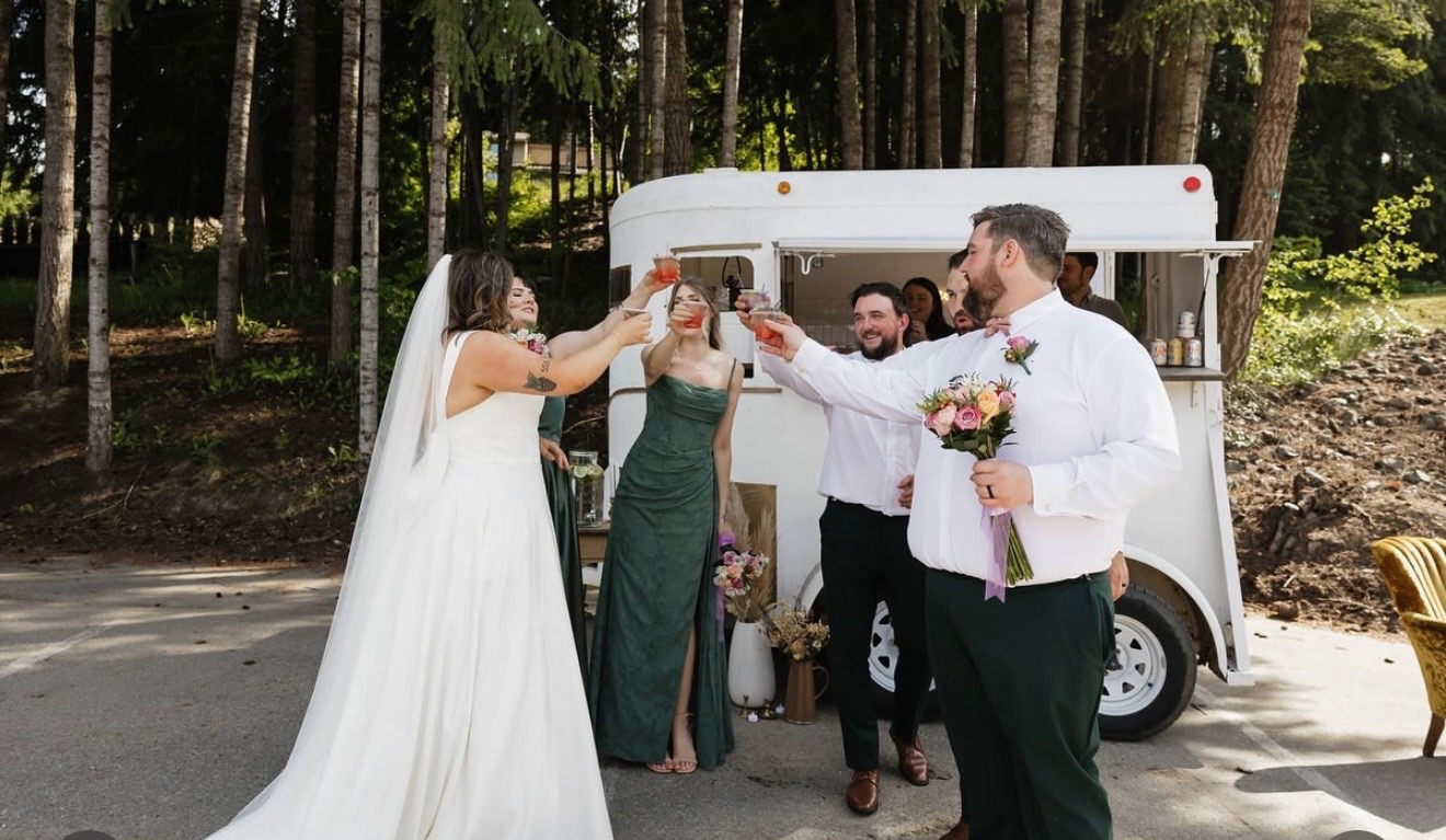 Wedding party toasting at The Wandering Bar
